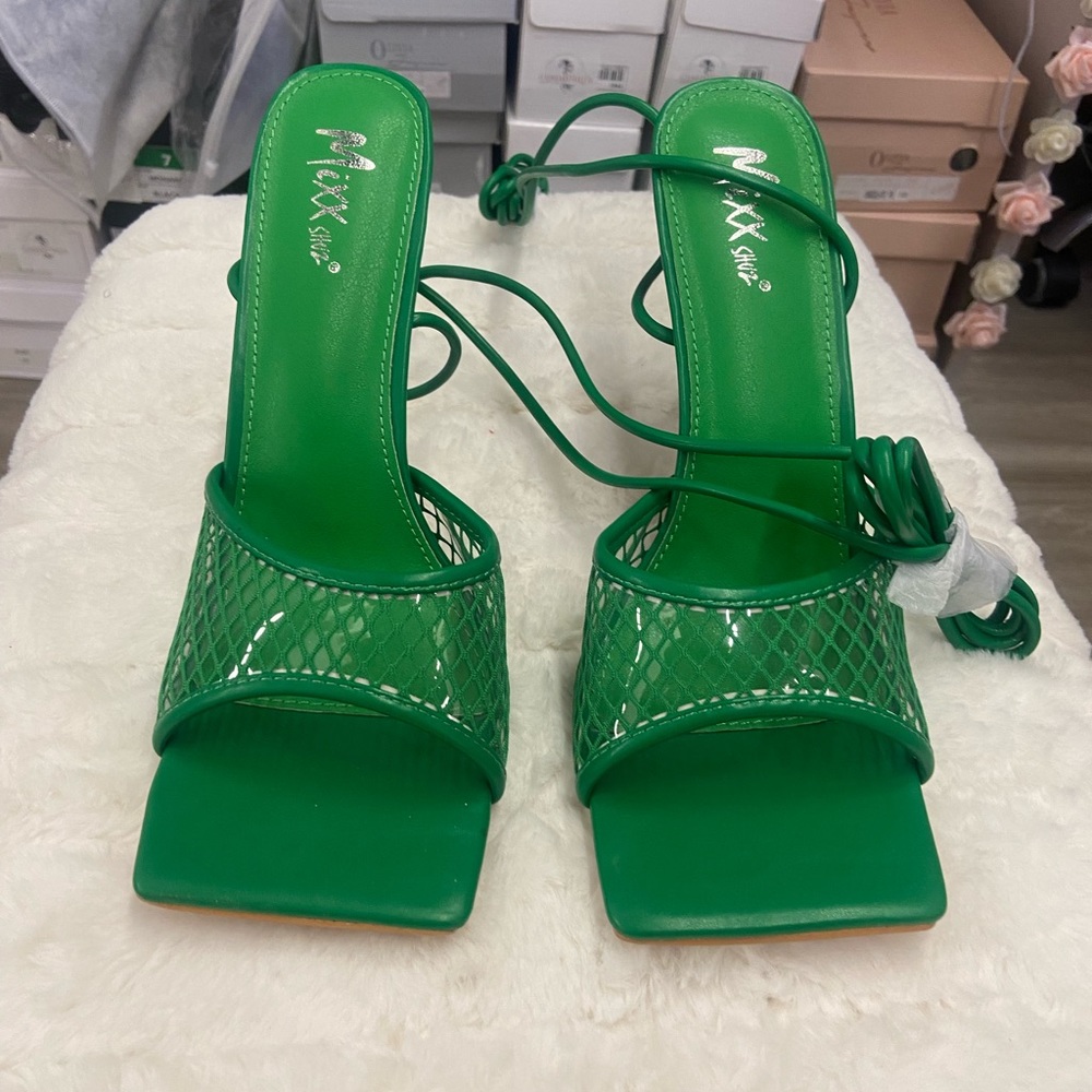 Green heels tie around the ankle